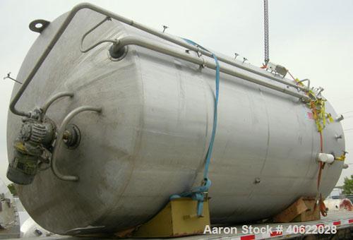 Used DCI tank, 4500 gallon, 304 stainless steel, jacketed. 89 1/4" diameter x 168" straight side. Dish top, sloped bottom. 22" bottom sidewall dimple jacket rated 150 psi @ 100 degrees F. Top opening...