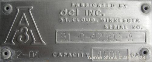 Used DCI tank, 4500 gallon, 304 stainless steel, jacketed. 89 1/4" diameter x 168" straight side. Dish top, sloped bottom. 22" bottom sidewall dimple jacket rated 150 psi @ 100 degrees F. Top opening...