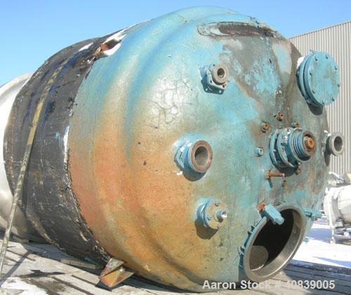 Used Tank, 1000 Gallon, 316 Stainless Steel, Vertical. 64" diameter x 64" straight side.  Dish top and bottom. Openings:  Top 18" manway with plastic cover, 2", (2) 4", 2 1/2", 4" drive, 8";  3" cent...