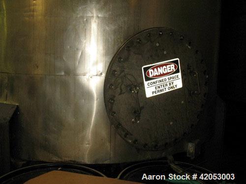 Used Tank, 3,600 Gallon, 316 Stainless Steel, Vertical, 7' diameter x 15' 6" high, Shell Thickness-0.105, Head Thickness-0.105,  Side Manway w/Cover, Steel Leg Mounted.