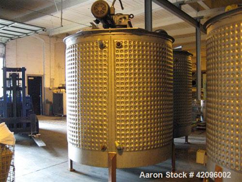 Used Open top 1200 gallons jacketed mixing tank 74" deep x 68" diameter, tapered bottom with a 3" drain stainless steel, steel legs, mixer head: type 1602, ration R 70/1, motor: 10 hp, 208/230/460 vo...