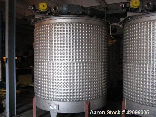 Used Open top 1200 gallons jacketed mixing tank 74" deep x 68" diameter, tapered bottom with a 3" drain stainless steel, steel legs, mixer head: type 1602, ration R 70/1, motor: 10 hp, 208/230/460 vo...