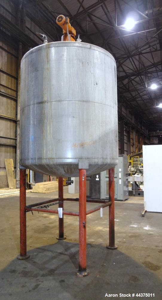 Used Tank, 1500 Gallon, 316 Stainless Steel, Vertical. Approximate 76" diameter x 72" straight side, dished top and bottom. Top entering ProQuip agitator, model  75JLS20, serial# 8287, ratio 20 to 1,...