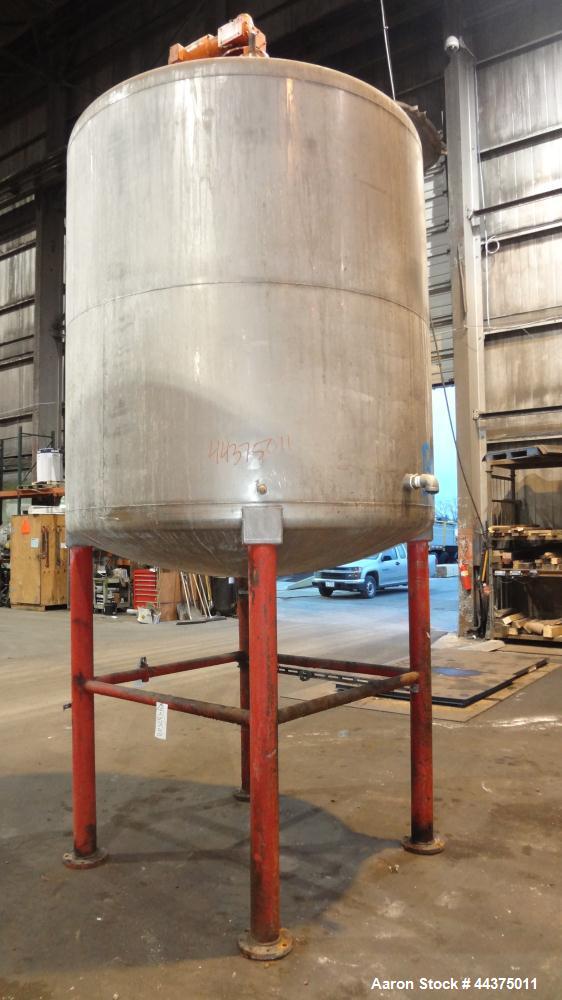 Used Tank, 1500 Gallon, 316 Stainless Steel, Vertical. Approximate 76" diameter x 72" straight side, dished top and bottom. Top entering ProQuip agitator, model  75JLS20, serial# 8287, ratio 20 to 1,...