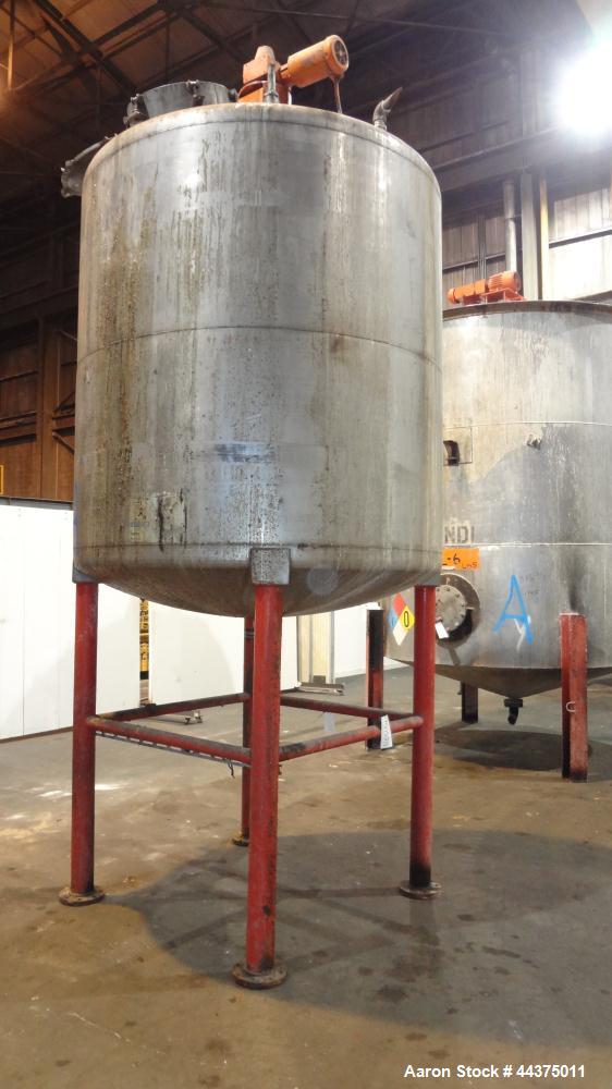 Used- Tank, 1500 Gallon, 316 Stainless Steel, Vertical. Approximate 76" diameter x 72" straight side, dished top and bottom....
