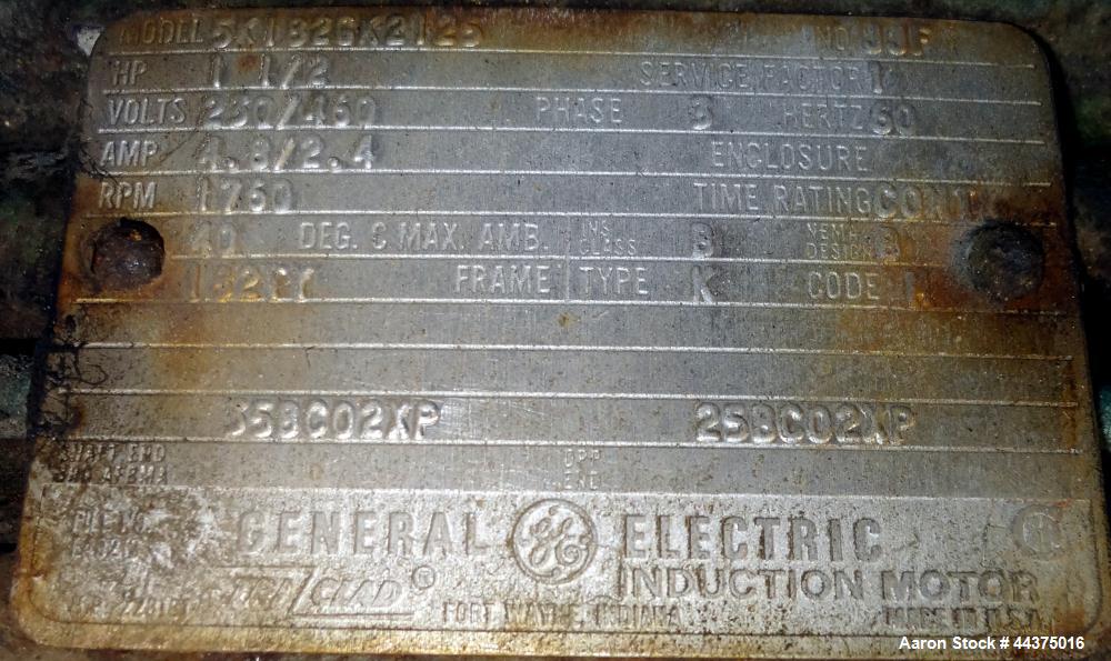 Used Tank, 3000 Gallon, 321 Stainless Steel, Vertical. Approximate 84" diameter x 118" straight side, flat welded top, coned bottom. Fixed carbon steel agitator bridge with a clamp on Lightnin agitat...