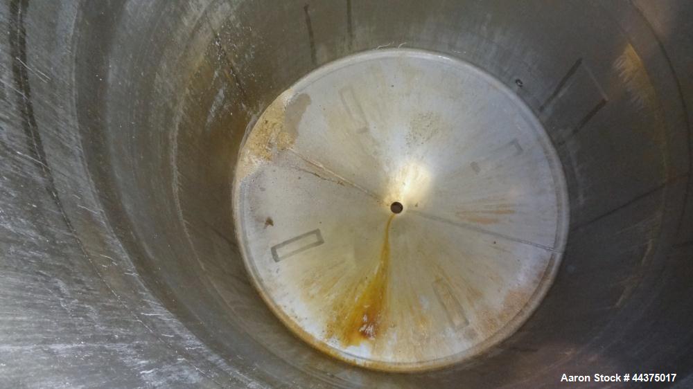 Used Tank, 3000 Gallon, 304 Stainless Steel, Vertical. Approximate 84" diameter x 118" straight side, flat welded top, coned bottom. Fixed carbon steel agitator bridge with a Lightnin agitator, model...