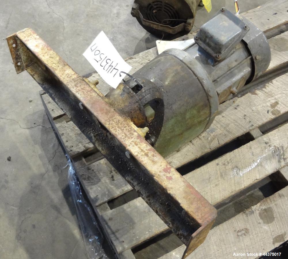 Used Tank, 3000 Gallon, 304 Stainless Steel, Vertical. Approximate 84" diameter x 118" straight side, flat welded top, coned bottom. Fixed carbon steel agitator bridge with a Lightnin agitator, model...