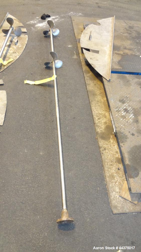 Used Tank, 3000 Gallon, 304 Stainless Steel, Vertical. Approximate 84" diameter x 118" straight side, flat welded top, coned bottom. Fixed carbon steel agitator bridge with a Lightnin agitator, model...