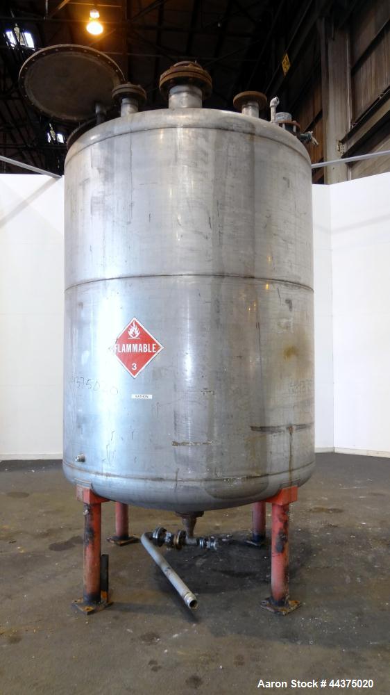 Used Chuck Gurdin Inc. Pressure Tank, 1800 Gallon, 304 Stainless Steel, Vertical. Approximate 76" diameter x 84" straight side, dished top and bottom. Internal rated 25 psi at 100 degrees F. Top ente...