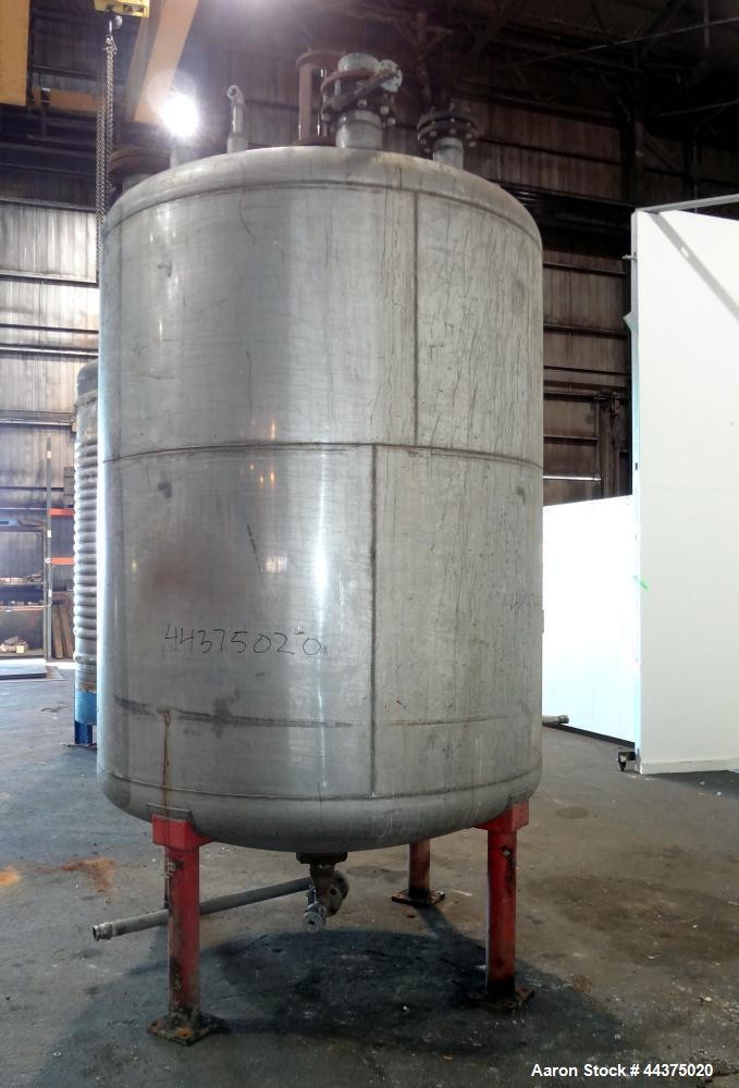 Used Chuck Gurdin Inc. Pressure Tank, 1800 Gallon, 304 Stainless Steel, Vertical. Approximate 76" diameter x 84" straight side, dished top and bottom. Internal rated 25 psi at 100 degrees F. Top ente...