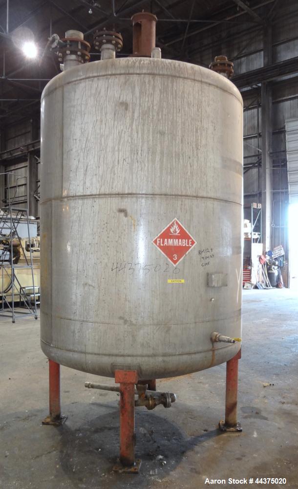 Used Chuck Gurdin Inc. Pressure Tank, 1800 Gallon, 304 Stainless Steel, Vertical. Approximate 76" diameter x 84" straight side, dished top and bottom. Internal rated 25 psi at 100 degrees F. Top ente...