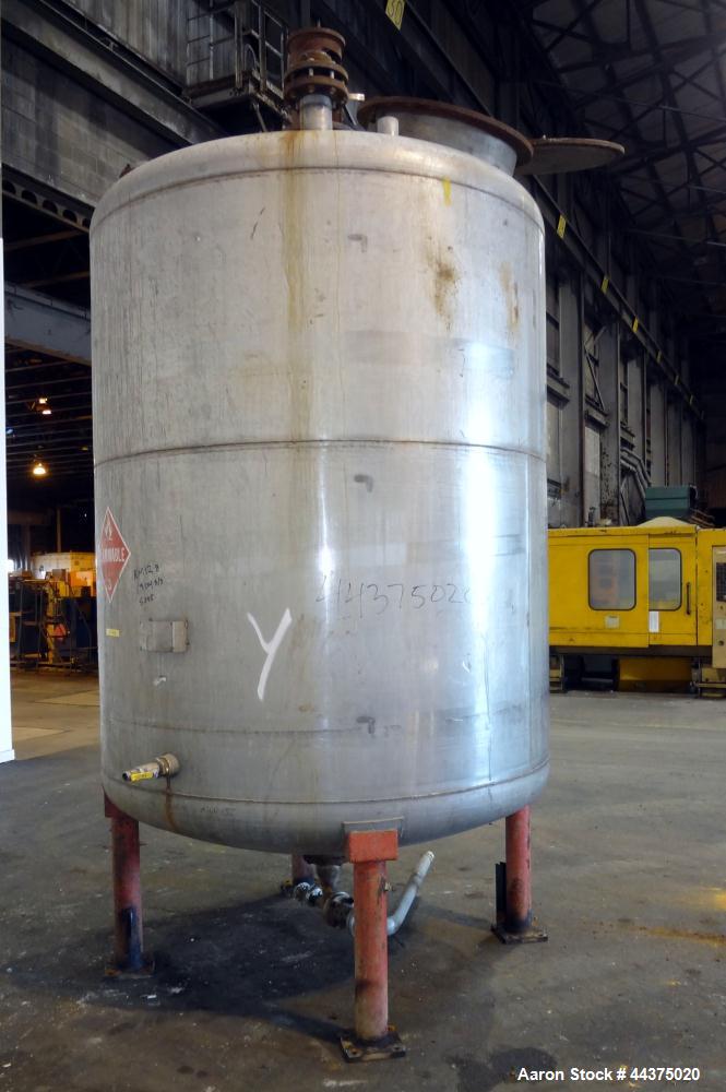 Used Chuck Gurdin Inc. Pressure Tank, 1800 Gallon, 304 Stainless Steel, Vertical. Approximate 76" diameter x 84" straight side, dished top and bottom. Internal rated 25 psi at 100 degrees F. Top ente...