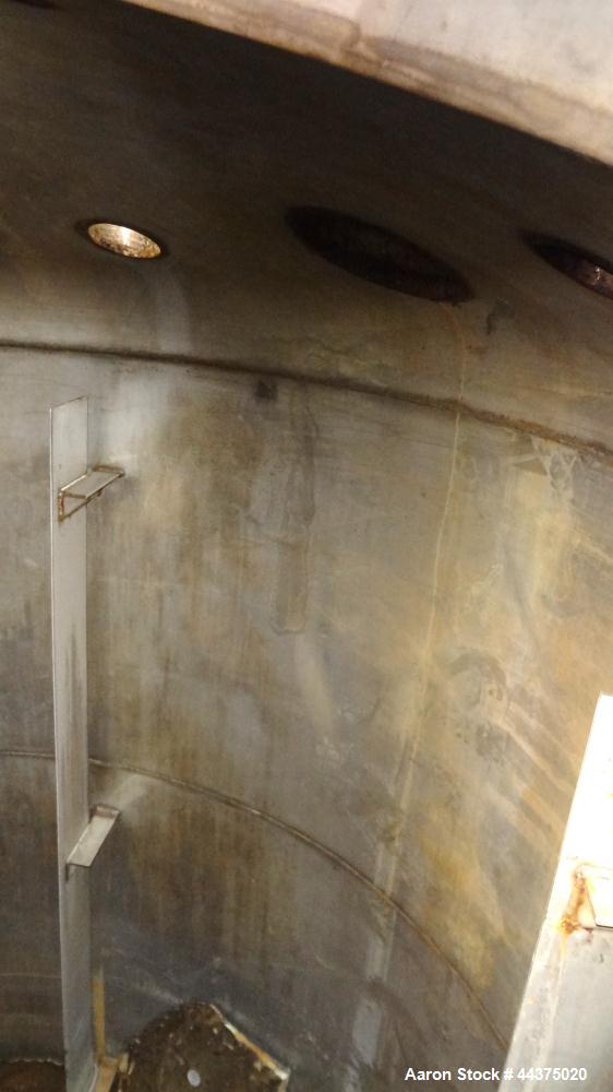 Used Chuck Gurdin Inc. Pressure Tank, 1800 Gallon, 304 Stainless Steel, Vertical. Approximate 76" diameter x 84" straight side, dished top and bottom. Internal rated 25 psi at 100 degrees F. Top ente...