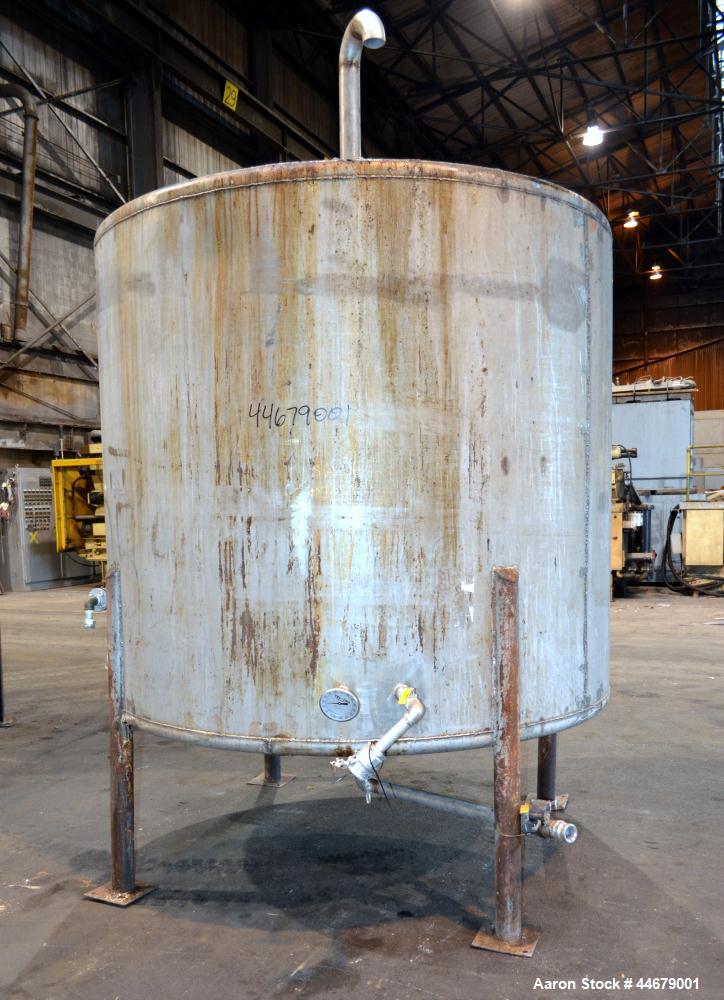 Used Tank, 1800 Gallon, 304 Stainless Steel, Vertical. Approximate 84” diameter x 72” straight side, coned top and bottom. (3) Turns of approximate 2” internal  pipe coil, no rating. (4) Sidewall baf...