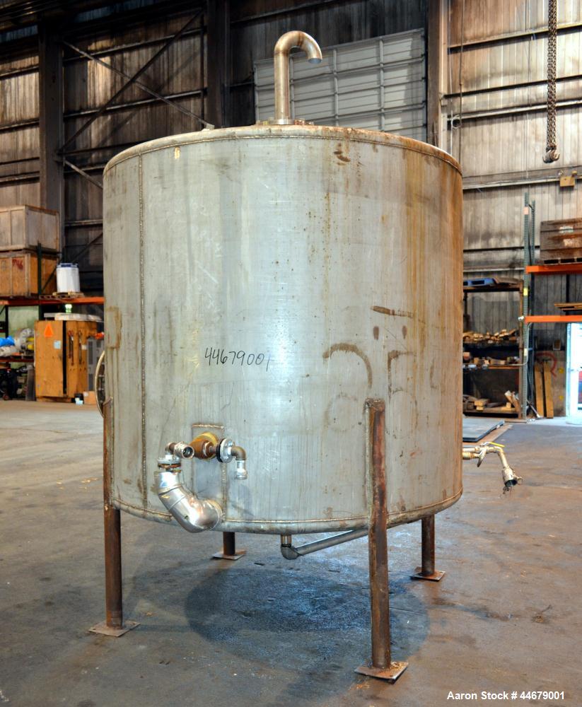 Used Tank, 1800 Gallon, 304 Stainless Steel, Vertical. Approximate 84” diameter x 72” straight side, coned top and bottom. (3) Turns of approximate 2” internal  pipe coil, no rating. (4) Sidewall baf...