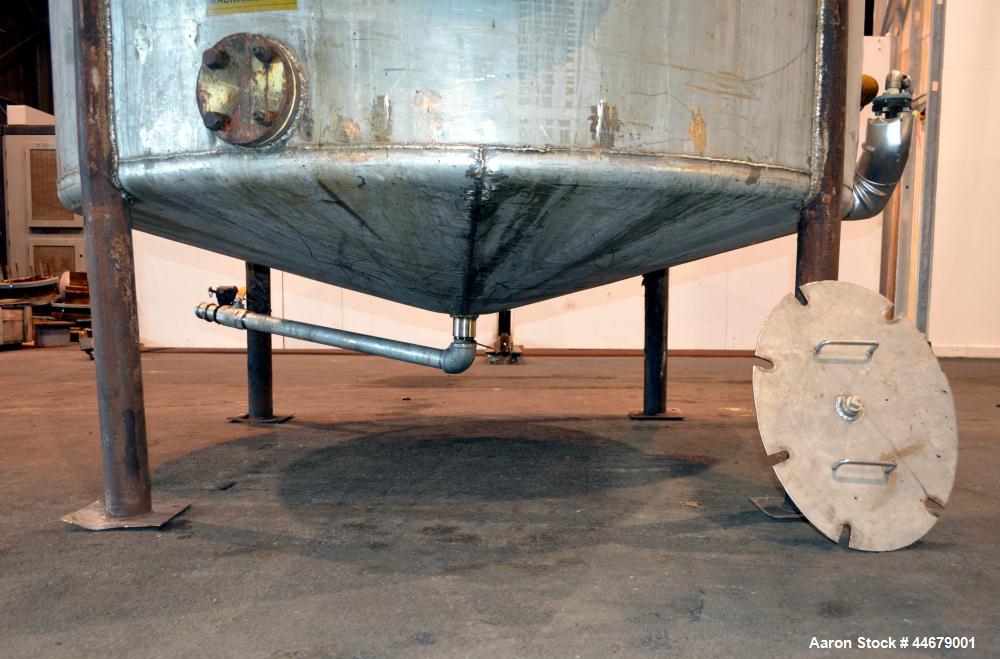 Used Tank, 1800 Gallon, 304 Stainless Steel, Vertical. Approximate 84” diameter x 72” straight side, coned top and bottom. (3) Turns of approximate 2” internal  pipe coil, no rating. (4) Sidewall baf...