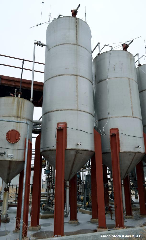 Used Par Piping & Fabrication Tank, 3500 Gallon, 304 Stainless Steel, Vertical. 72" Diameter x 192" straight side, coned top & bottom, (1) spray nozzle. Openings top 2", 3", 8", 19" man way with cove...