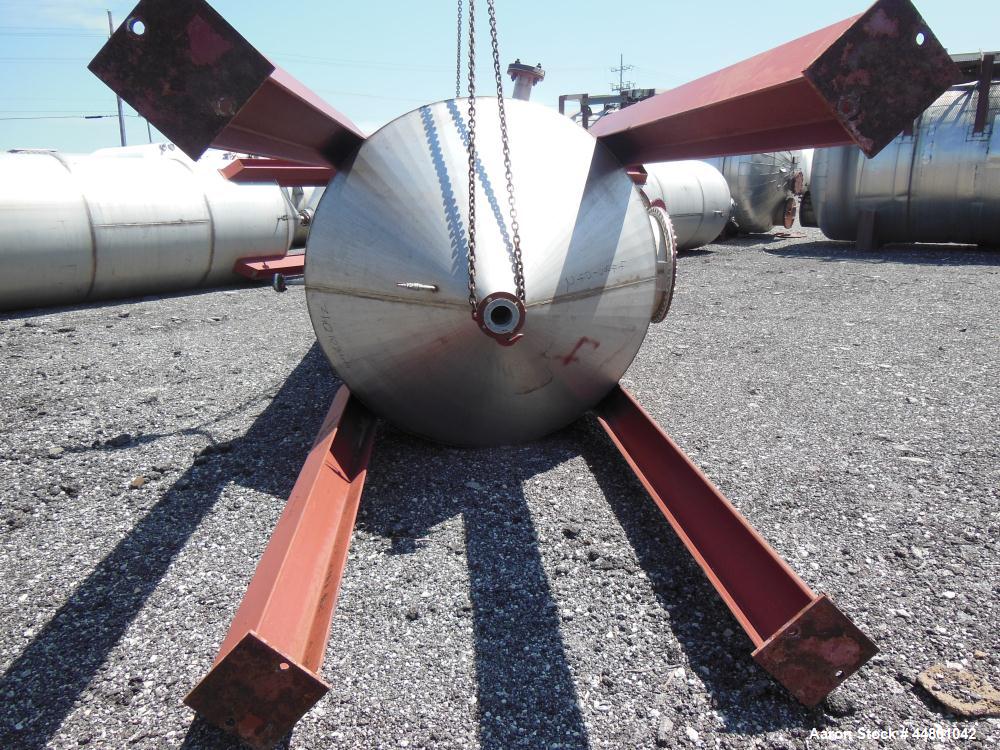 Used Par Piping & Fabrication Tank, 2500 Gallon, 321 Stainless Steel, Vertical. 72" Diameter x 144" straight side, coned top & bottom, (1) spray nozzle. Openings top (2) 2", 6", 19" man way with cove...