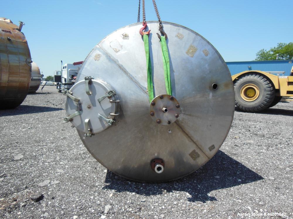 Used Par Piping & Fabrication Tank, 2500 Gallon, 321 Stainless Steel, Vertical. 72" Diameter x 144" straight side, coned top & bottom, (1) spray nozzle. Openings top (2) 2", 6", 19" man way with cove...
