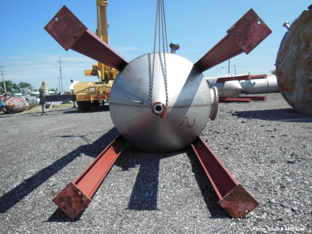 Used Par Piping & Fabrication Tank, 2500 Gallon, 321 Stainless Steel, Vertical. 72" Diameter x 144" straight side, coned top & bottom, (1) spray nozzle. Openings top (2) 2", 6", 19" man way with cove...