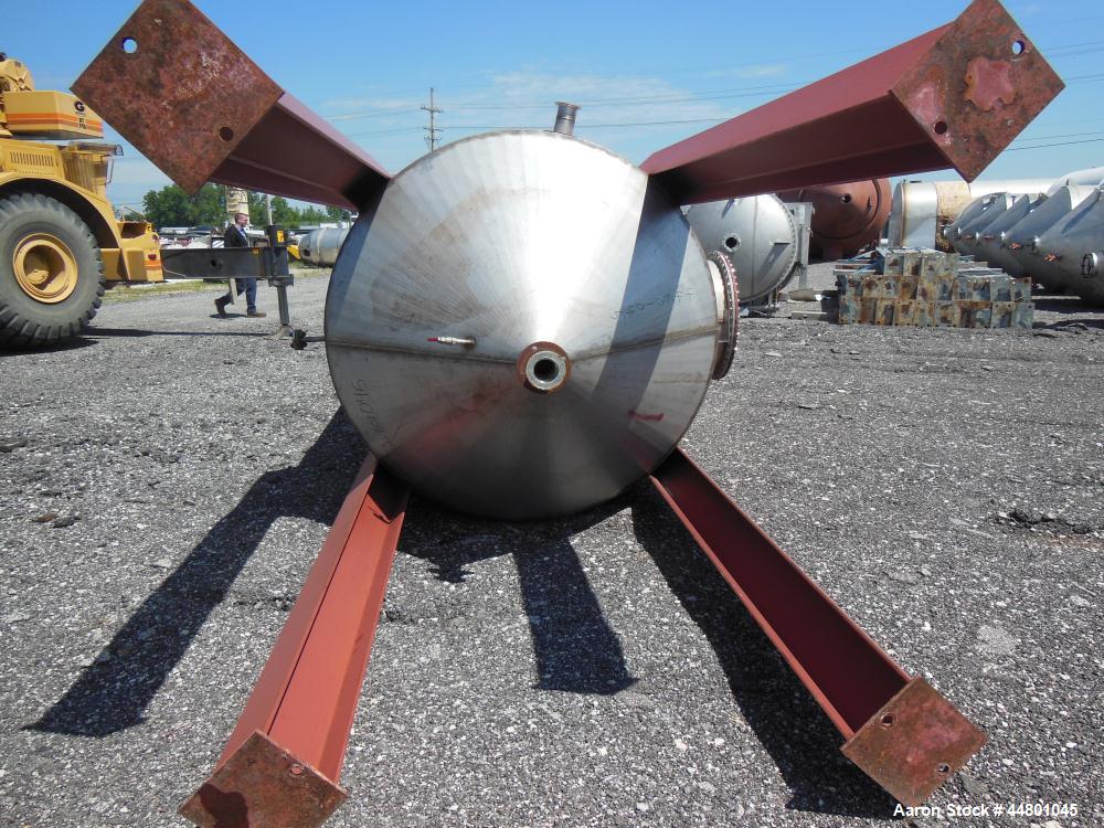 Used Par Piping & Fabrication Tank, 2500 Gallon, 321 Stainless Steel, Vertical. 72" Diameter x 144" straight side, coned top & bottom, (1) spray nozzle. Openings top (2) 2", 6", 19" man way with cove...