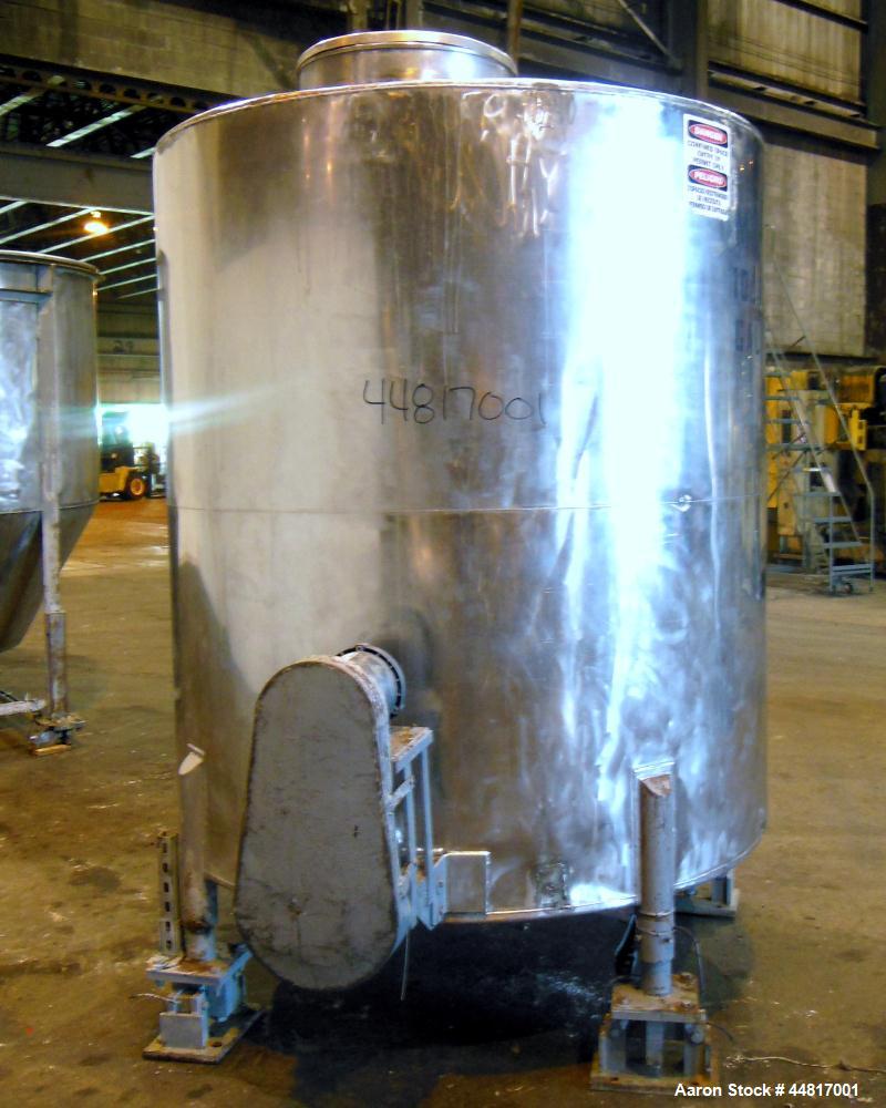 Used Tank, 1000 Gallons, 304 Stainless Steel, Vertical. Approximately 67" diameter x 72" straight side, flat welded top, slight dished bottom. Side bottom entering agitator with a (3) blade prop driv...