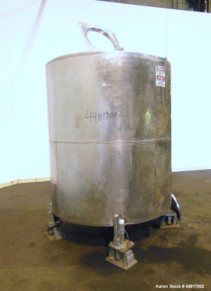 Used Tank, 1000 Gallons, 304 Stainless Steel, Vertical. Approximately 67" diameter x 72" straight side, flat welded top, slight dished bottom. Top entering clamp agitator, 1" diameter shaft with (2) ...
