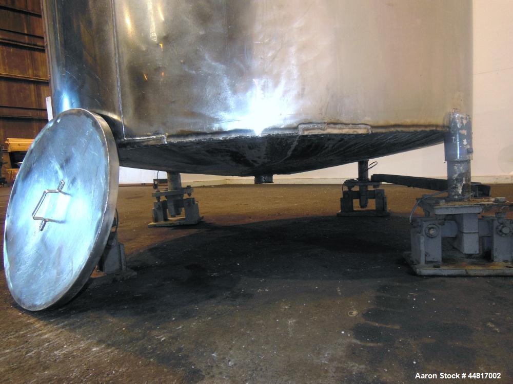 Used Tank, 1000 Gallons, 304 Stainless Steel, Vertical. Approximately 67" diameter x 72" straight side, flat welded top, slight dished bottom. Top entering clamp agitator, 1" diameter shaft with (2) ...