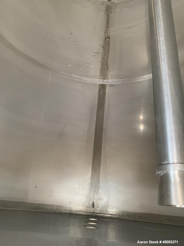 Unused- Schlueter Insulated 1,200 Gallon Tank, Stainless Steel, Vertical. Approximate 64" diameter x 87" straight side. Flat...