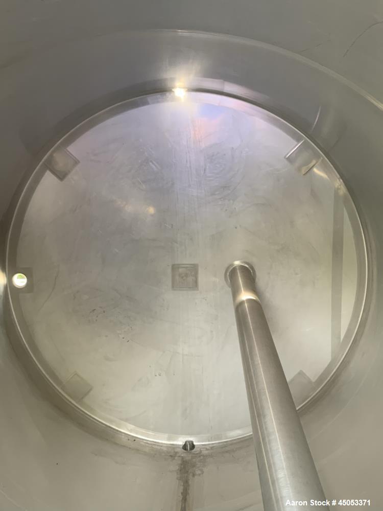 Unused- Schlueter Insulated 1,200 Gallon Tank, Stainless Steel, Vertical. Approximate 64" diameter x 87" straight side. Flat...