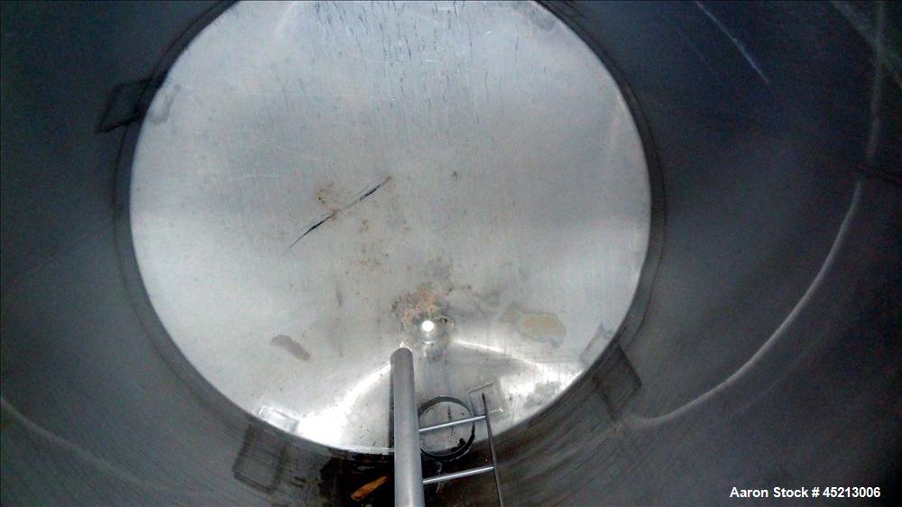 Used Tank, 1300 Gallon, 304 Stainless Steel, Vertical. Approximately 68" diameter x 83" straight side, flat top with a 1/3 cover, slant cone bottom. Bolt on aluminum agitator bridge, provision for a ...