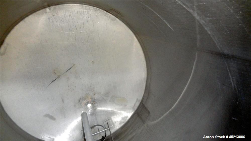 Used Tank, 1300 Gallon, 304 Stainless Steel, Vertical. Approximately 68" diameter x 83" straight side, flat top with a 1/3 cover, slant cone bottom. Bolt on aluminum agitator bridge, provision for a ...