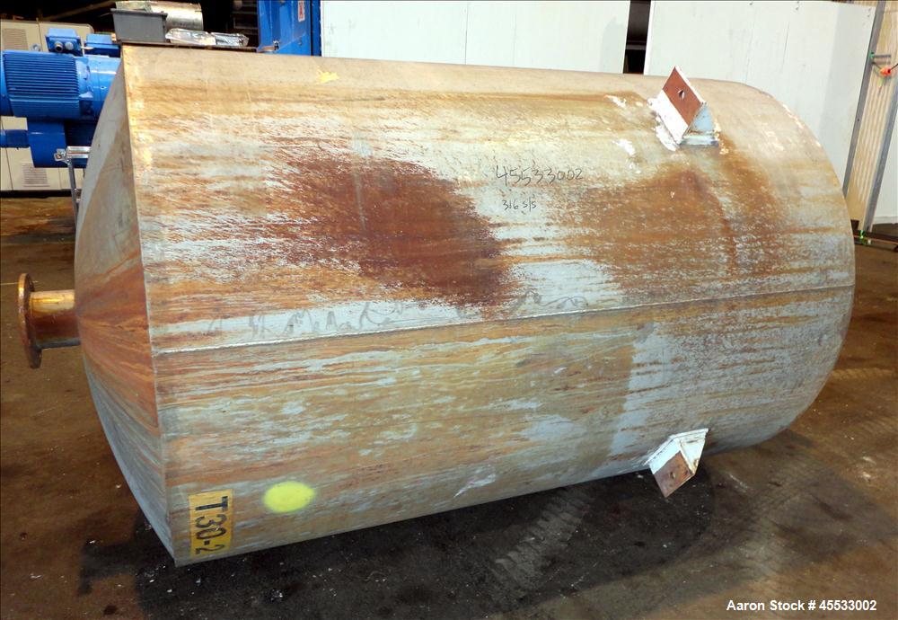 Used 1244 Gallon, 316 Stainless Steel Tank. Approximately 65" diameter x 84" straight side. Dished top and bottom. 10" flange top center opening, 10" side outlet and a 6" center bottom outlet. Includ...