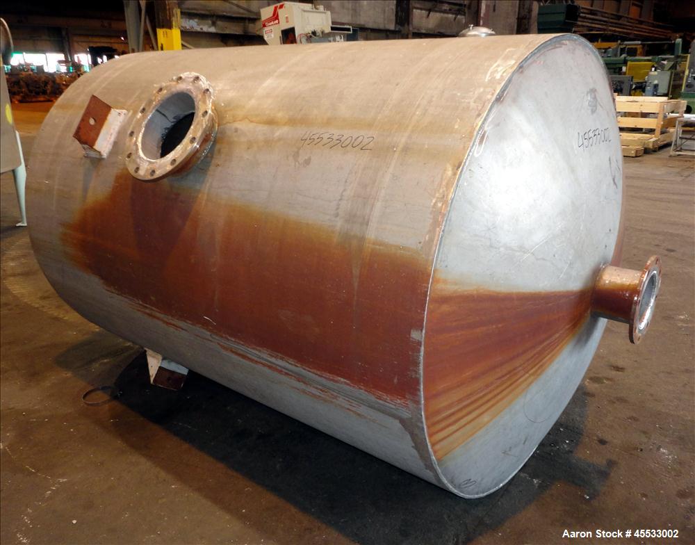 Used 1244 Gallon, 316 Stainless Steel Tank. Approximately 65" diameter x 84" straight side. Dished top and bottom. 10" flange top center opening, 10" side outlet and a 6" center bottom outlet. Includ...