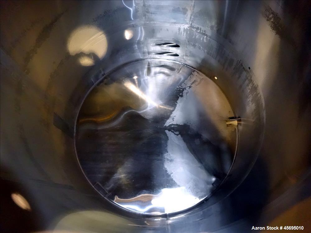 Used Tank, 3500 Gallon, 304 Stainless Steel, Vertical. 96" Diameter x 115" straight side, dished top, sloped bottom. (1) Spray Ball. Openings top 4", 8", 16" man way with cover. 4" Tri-clamp side bot...