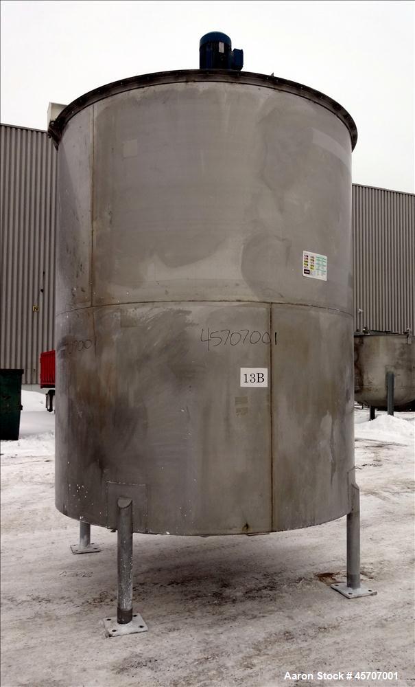 Used Bright Sheet Metal Tank, Approximately 4,000 Gallon, 304 Stainless Steel, Vertical. 100" diameter x 120" straight side. Flat top, coned bottom. 34" x 32" top hinged manway cover, 2" center botto...