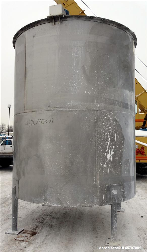 Used Bright Sheet Metal Tank, Approximately 4,000 Gallon, 304 Stainless Steel, Vertical. 100" diameter x 120" straight side. Flat top, coned bottom. 34" x 32" top hinged manway cover, 2" center botto...