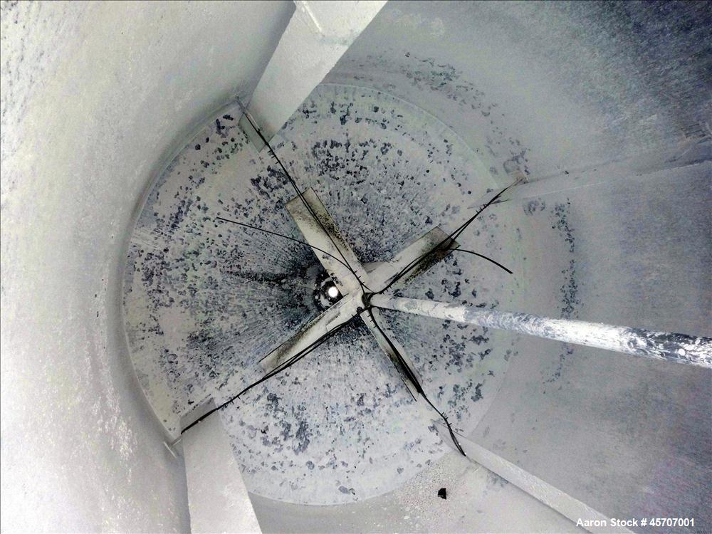 Used Bright Sheet Metal Tank, Approximately 4,000 Gallon, 304 Stainless Steel, Vertical. 100" diameter x 120" straight side. Flat top, coned bottom. 34" x 32" top hinged manway cover, 2" center botto...