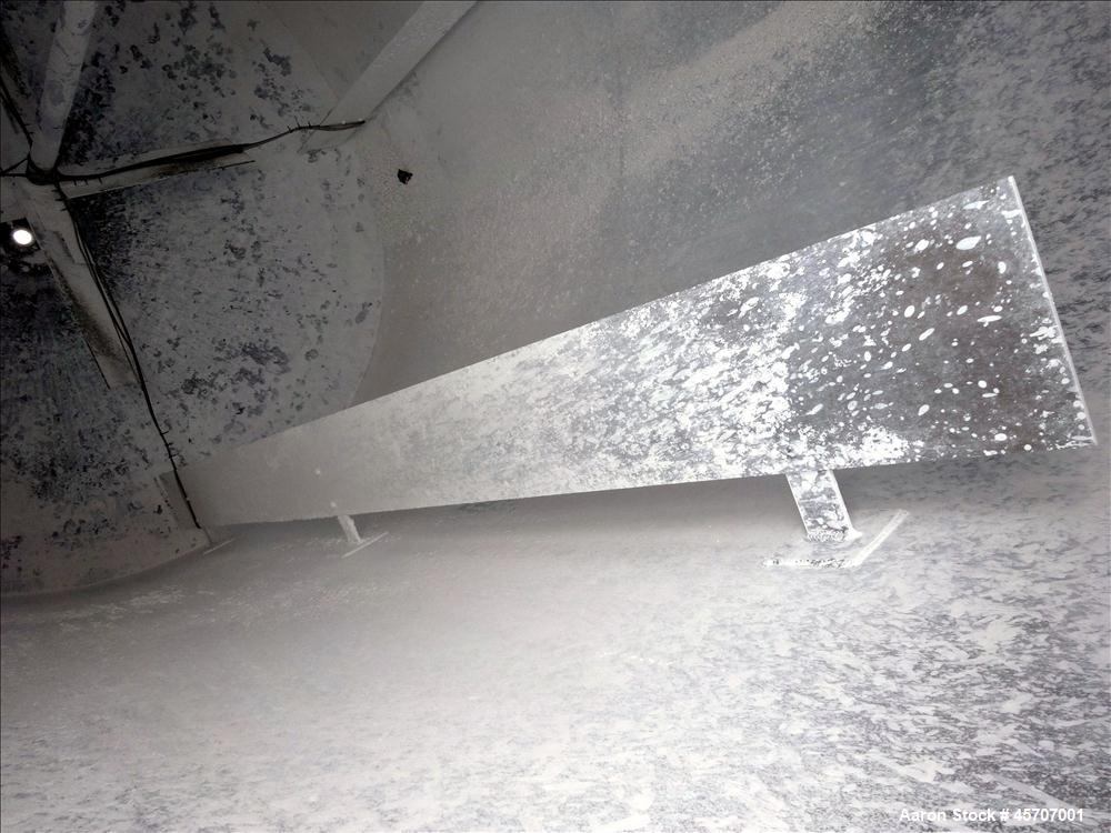 Used Bright Sheet Metal Tank, Approximately 4,000 Gallon, 304 Stainless Steel, Vertical. 100" diameter x 120" straight side. Flat top, coned bottom. 34" x 32" top hinged manway cover, 2" center botto...