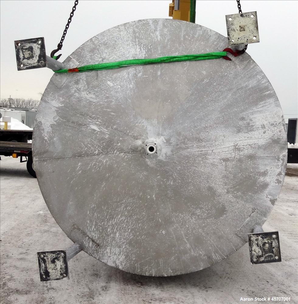 Used Bright Sheet Metal Tank, Approximately 4,000 Gallon, 304 Stainless Steel, Vertical. 100" diameter x 120" straight side. Flat top, coned bottom. 34" x 32" top hinged manway cover, 2" center botto...