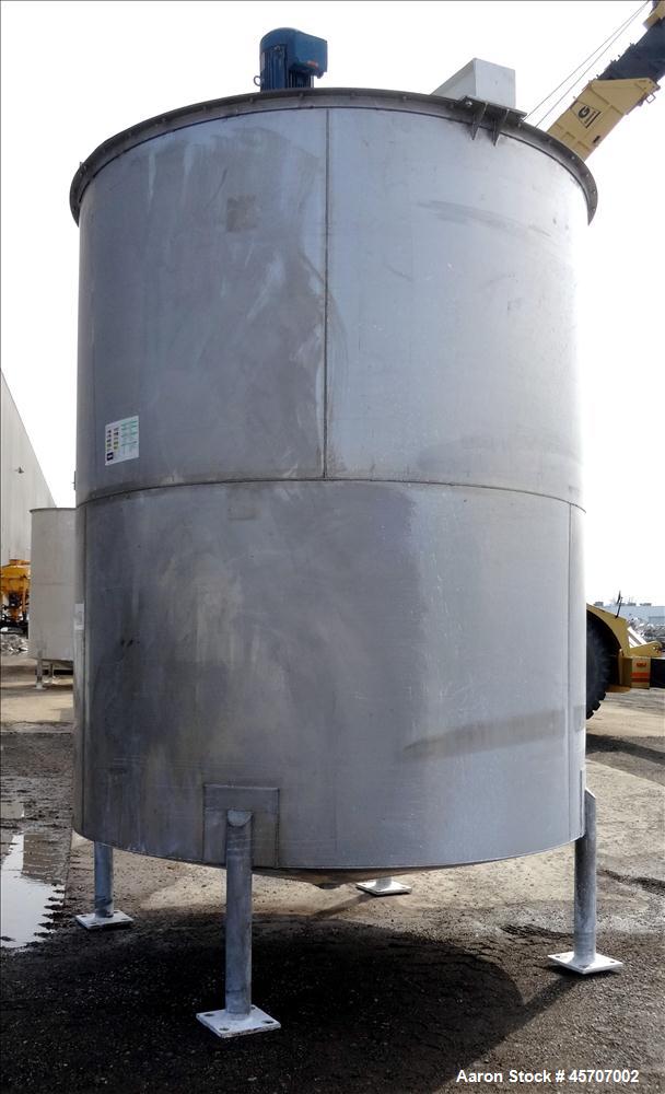 Used Bright Sheet Metal Tank, Approximately 4,000 Gallon, 304 Stainless Steel, Vertical. 100" diameter x 120" straight side. Flat top, coned bottom. 34" x 32" top hinged manway cover, 2" center botto...