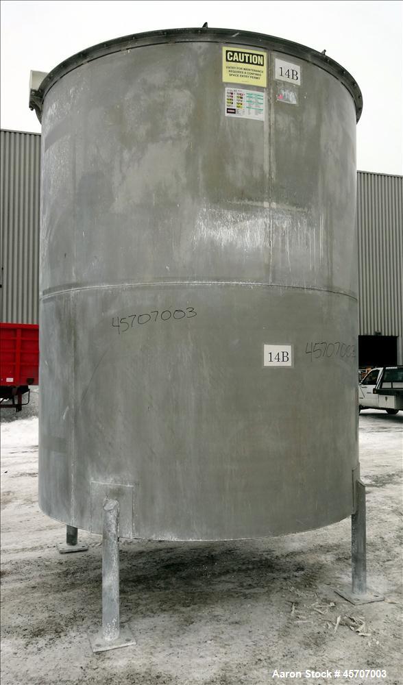 Used Bright Sheet Metal Tank, Approximately 4,000 Gallon, 304 Stainless Steel, Vertical. 100" diameter x 120" straight side. Flat top, coned bottom. 34" x 32" top hinged manway cover, 2" center botto...