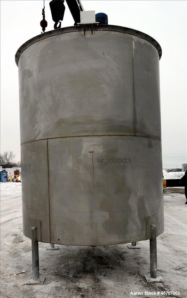 Used Bright Sheet Metal Tank, Approximately 4,000 Gallon, 304 Stainless Steel, Vertical. 100" diameter x 120" straight side. Flat top, coned bottom. 34" x 32" top hinged manway cover, 2" center botto...