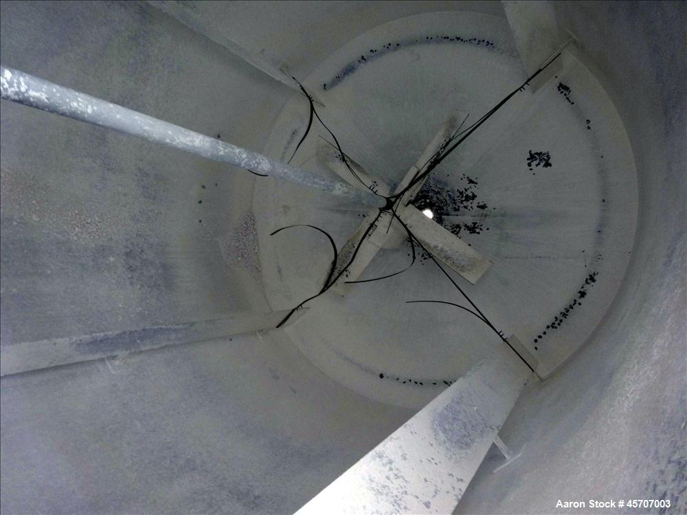 Used Bright Sheet Metal Tank, Approximately 4,000 Gallon, 304 Stainless Steel, Vertical. 100" diameter x 120" straight side. Flat top, coned bottom. 34" x 32" top hinged manway cover, 2" center botto...