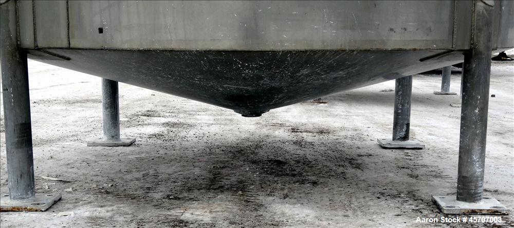 Used Bright Sheet Metal Tank, Approximately 4,000 Gallon, 304 Stainless Steel, Vertical. 100" diameter x 120" straight side. Flat top, coned bottom. 34" x 32" top hinged manway cover, 2" center botto...