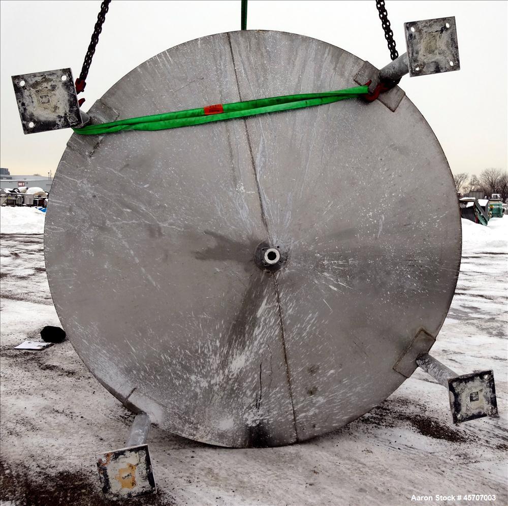 Used Bright Sheet Metal Tank, Approximately 4,000 Gallon, 304 Stainless Steel, Vertical. 100" diameter x 120" straight side. Flat top, coned bottom. 34" x 32" top hinged manway cover, 2" center botto...
