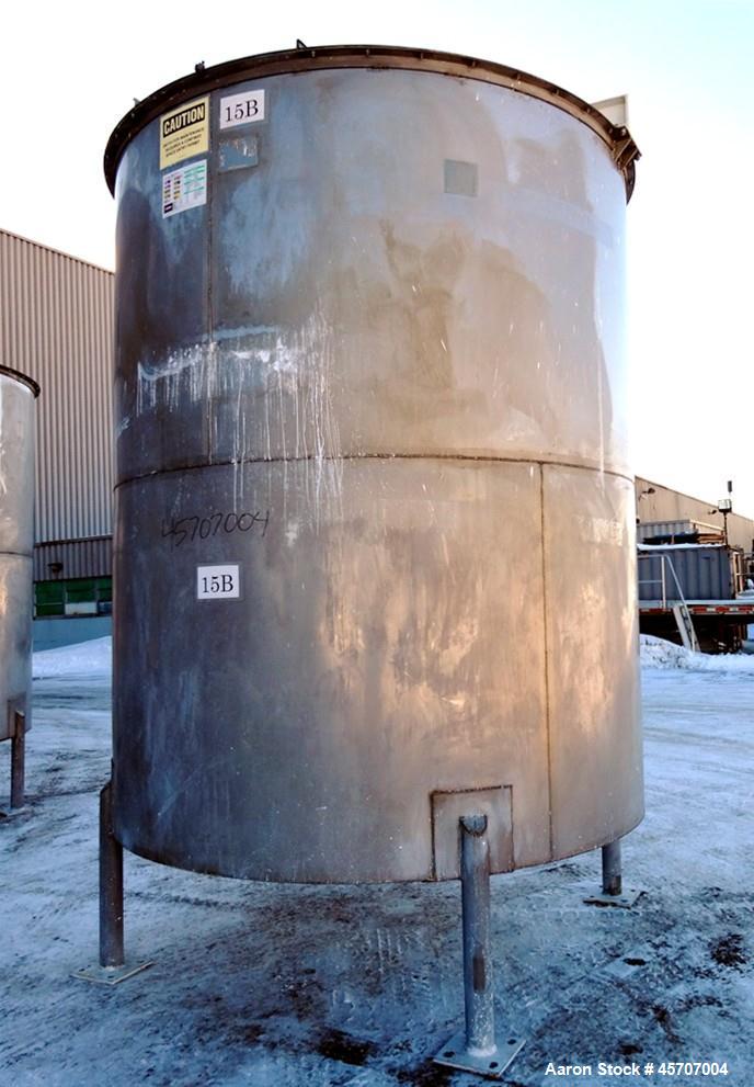 Used Bright Sheet Metal Tank, Approximately 4,000 Gallon, 304 Stainless Steel, Vertical. 100" diameter x 120" straight side. Flat top, coned bottom. 34" x 32" top hinged manway cover, 2" center botto...