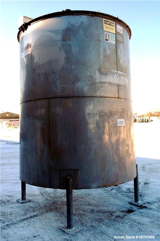 Used Bright Sheet Metal Tank, Approximately 4,000 Gallon, 304 Stainless Steel, Vertical. 100" diameter x 120" straight side. Flat top, coned bottom. 34" x 32" top hinged manway cover, 2" center botto...