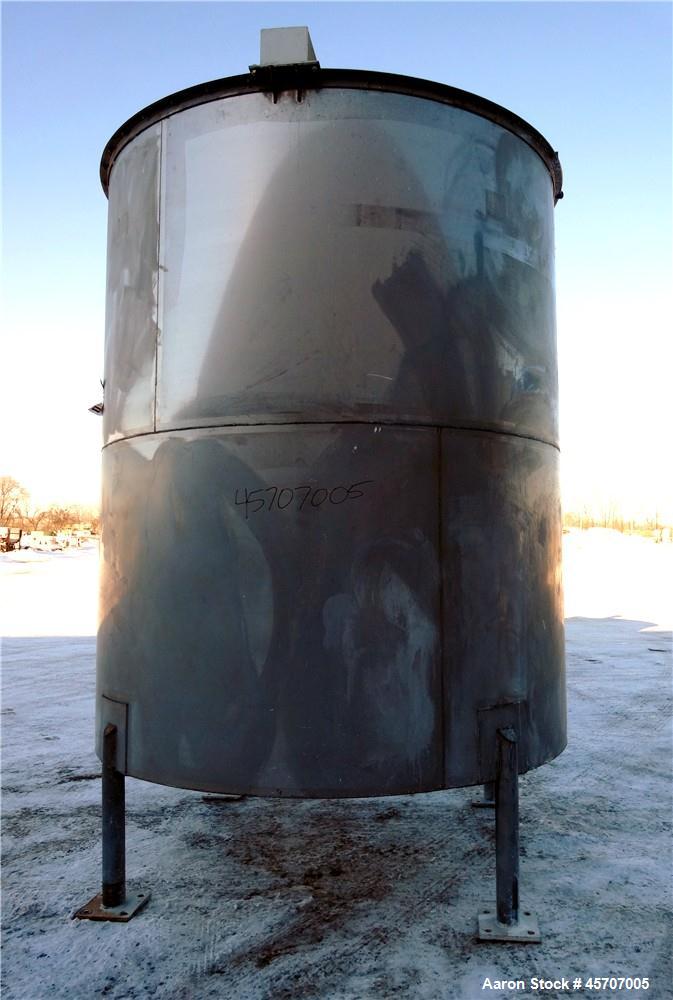 Used Bright Sheet Metal Tank, Approximately 4,000 Gallon, 304 Stainless Steel, Vertical. 100" diameter x 120" straight side. Flat top, coned bottom. 34" x 32" top hinged manway cover, 2" center botto...
